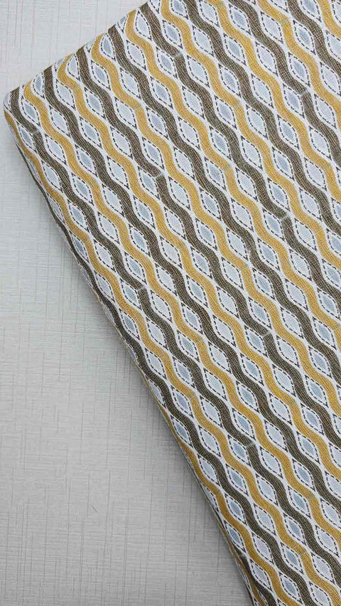White and gold striped fabric